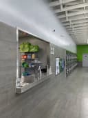 Coin Laundry Co service counter with branded bags